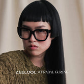 Refined black cat-eyes with a timeless elegance.
